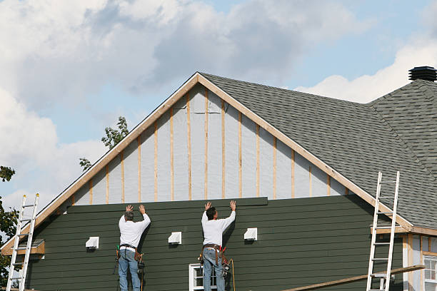 Professional Siding technician working in New Albany, IN